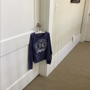 Dark blue justice long sleeved shirt size 10